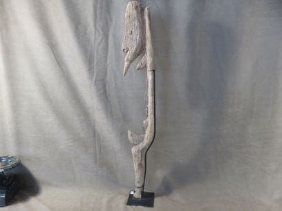 Yipwon. Highly stylized anthropomorphic figure....