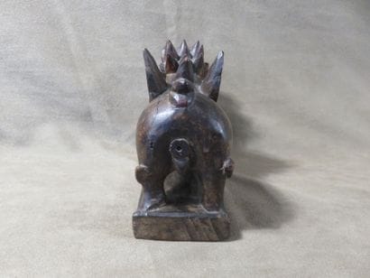 Reliquary box representing a singa standing...