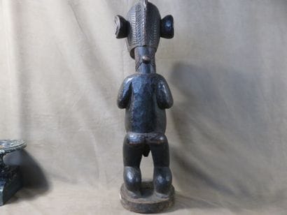 Male statue representing a B'mba (nimba)...