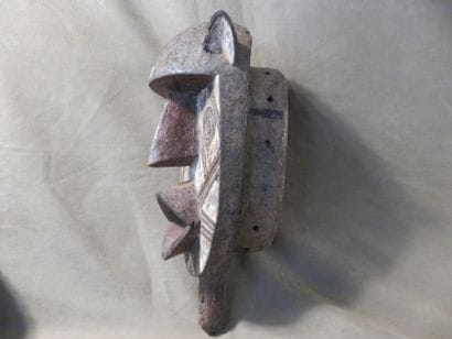 Zoomorphic mask representing a monkey. This...