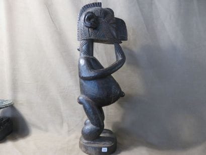 Male statue representing a B'mba (nimba)...