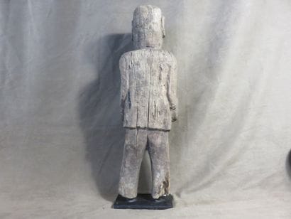 Fetish represented standing. Wood with light...