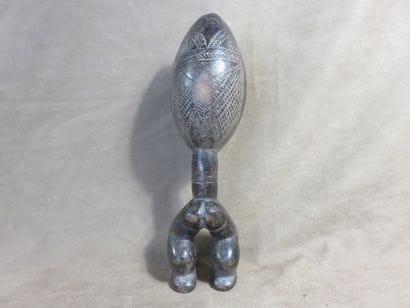 Spoon. The spoon is carried by two legs,...