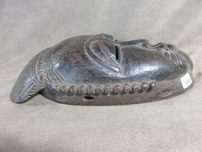Ndoma portrait mask with idealized face....