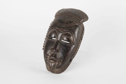 Ndoma portrait mask with idealized face....