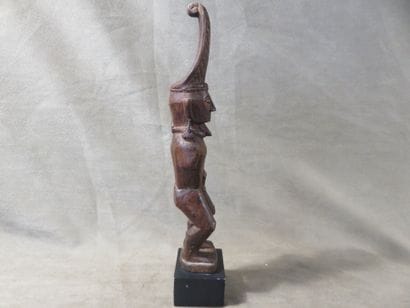 Statue of an Adu Zatua ancestor represented...