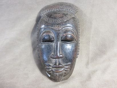 Ndoma portrait mask with idealized face....