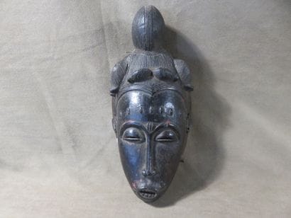 Ndoma portrait mask with idealized face....