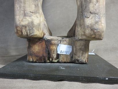 Tau tau. Male funerary statue represented...