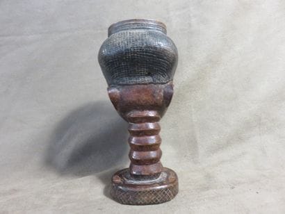 Palm wine cup representing a human head....
