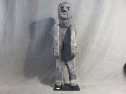 Fetish represented standing. Wood with light...