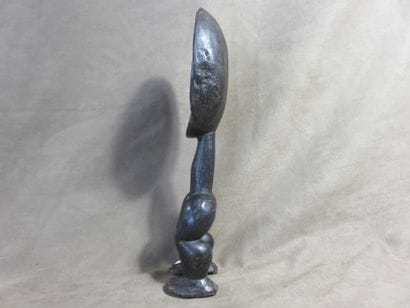 Spoon. The spoon is carried by two legs....