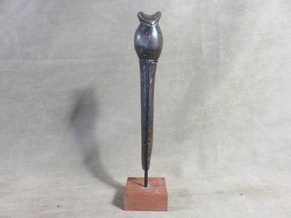 Whistle with a bulb topped by a mouthpiece,...