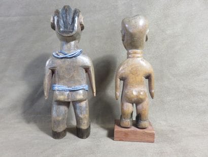 Two fetishes represented standing with their...