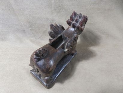 Reliquary box representing a singa standing...
