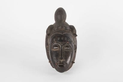 Ndoma portrait mask with idealized face....
