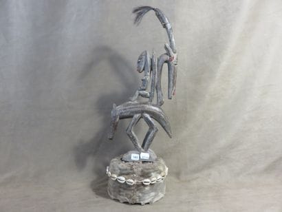 Tyi-Wara. Crest mask resting on its dance...
