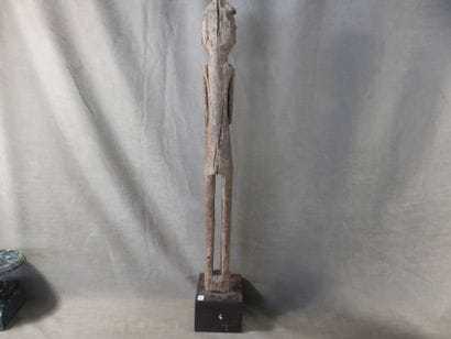 Character represented standing with his arms...
