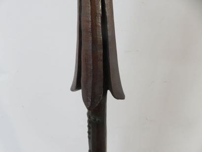 Long war spear with multiple protruding barbs...