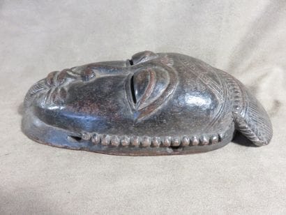 Ndoma portrait mask with idealized face....