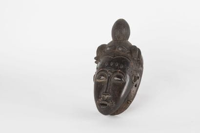 Ndoma portrait mask with idealized face....