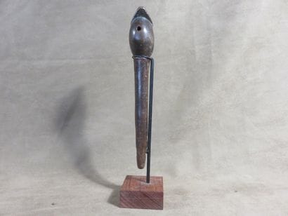 Whistle with a bulb topped by a mouthpiece,...