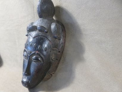 Ndoma portrait mask with idealized face....