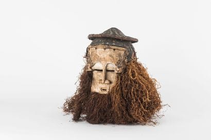 Dance mask. The face is inscribed in a rectangle,...