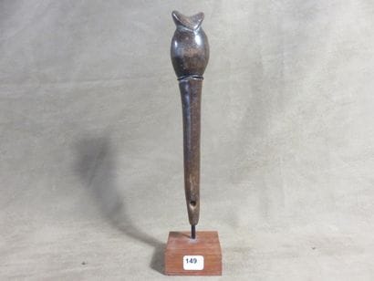 Whistle with a bulb topped by a mouthpiece,...
