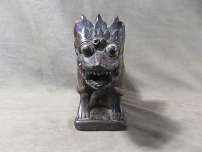 Reliquary box representing a singa standing...