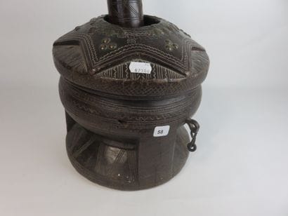 Mortar and pestle. Wood with a patina of...