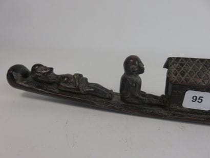 Funerary boat representing a couple of characters...