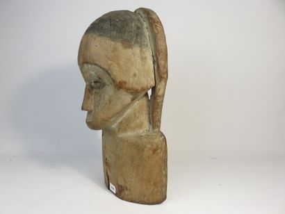 Bust mask. The face is heart-shaped. Hardwood...