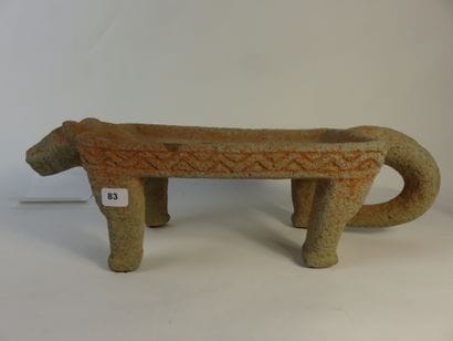 Metate. Grinding table representing a jaguar....