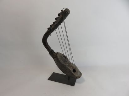Five-stringed harp. Music played an important...