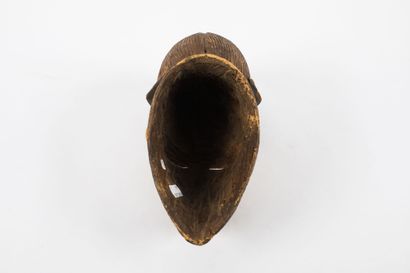 Okuyi dance mask representing an idealized...