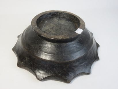 Star-shaped ritual cup. Wood with a patina...