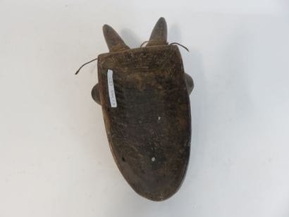 Passport mask representing a face with two...