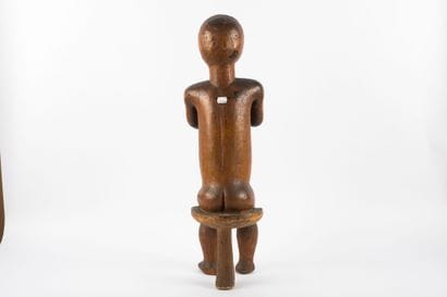 Male figure representing a byeri. The hands...