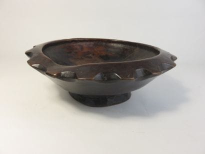 Star-shaped ritual cup. Wood with a patina...