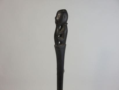 Tun-tun. It is surmounted by a small squatting...