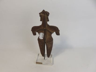 Statuette represented standing with both...