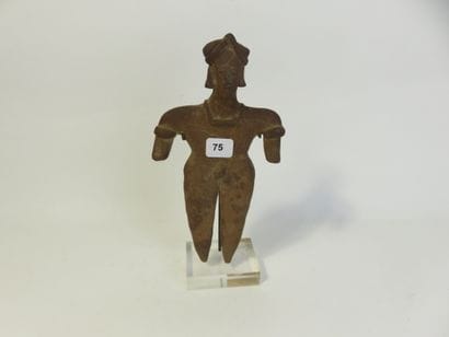 Statuette represented standing with both...