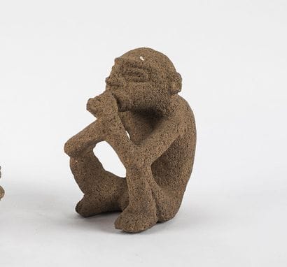 Sukia. Personage smoking or eating a corn...