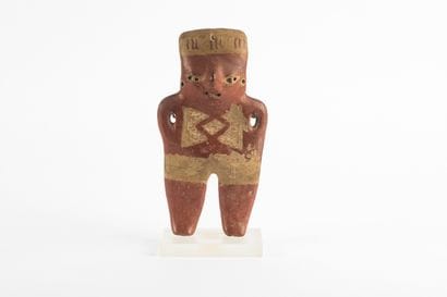 Statuette represented standing with both...