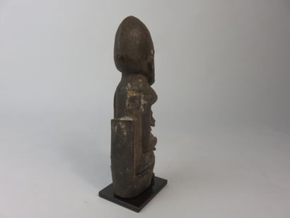 Maternity seated on a high-backed throne,...