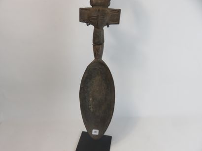Spoon. The handle is decorated with a very...