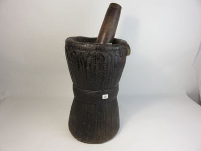 Mortar and pestle in heavy wood with patina...