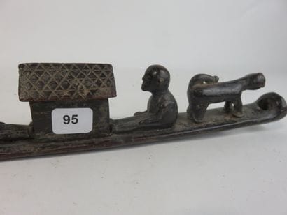 Funerary boat representing a couple of characters...