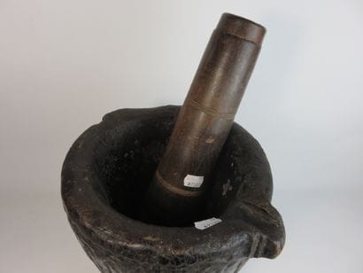Mortar and pestle in heavy wood with patina...